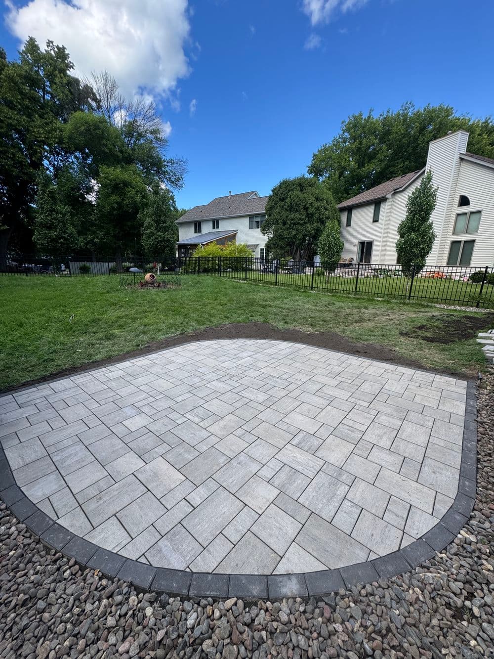 Custom Eye-Shaped Paver Patio Built in Maple Grove image