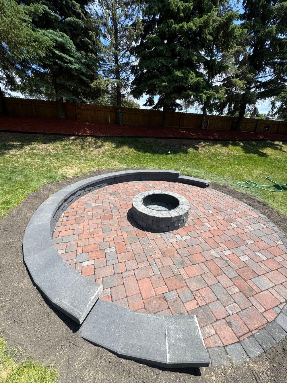 Gallery photos for Paver Patio, Fire Feature, and Sitting Wall Built in Maple Grove: Image #1
