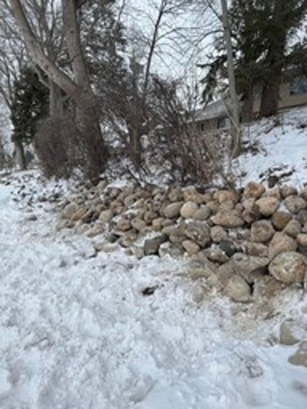 Gallery photos for Boulder Installation on Rice Lake in Maple Grove: Image #1